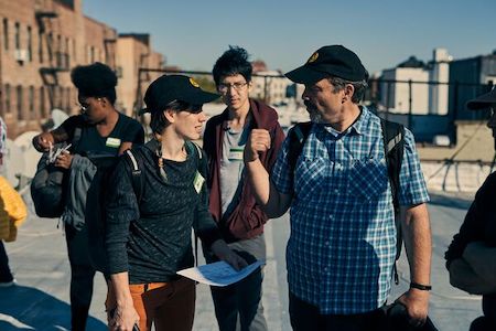 A group of people on the street talking